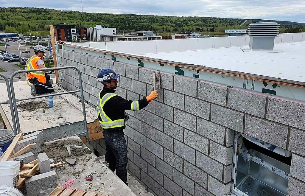 Pose de blocs architecturaux Complexe Fraser RDL